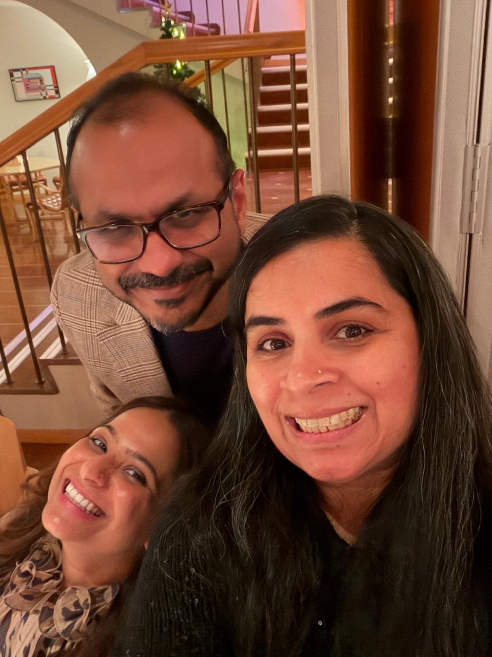 Sonal taking a selfie with two colleagues