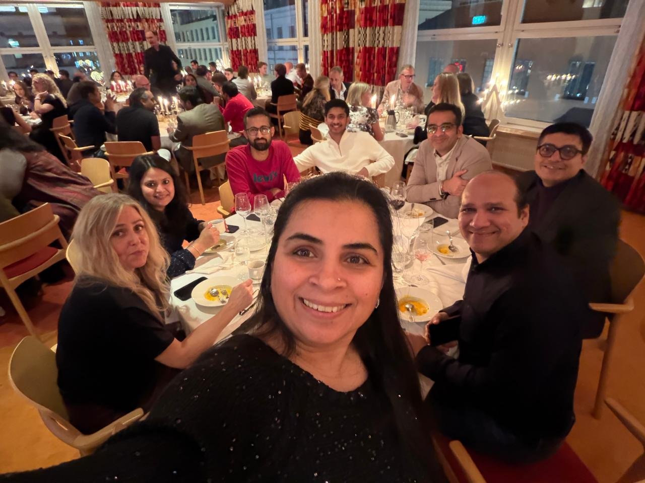 Sonal with colleagues at a team dinner